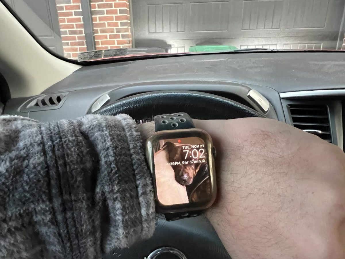 Nolan Shelinsky checks his Apple Watch right as he leaves his house to get to school.