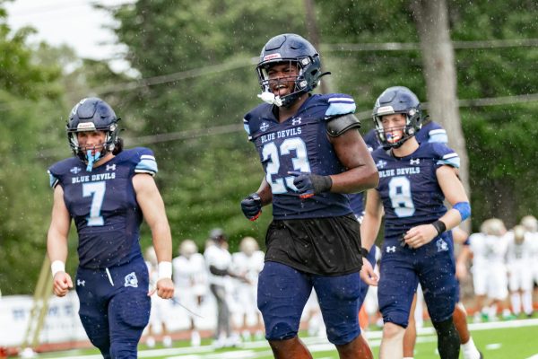 Sadiek runs off the field after a defensive stop.