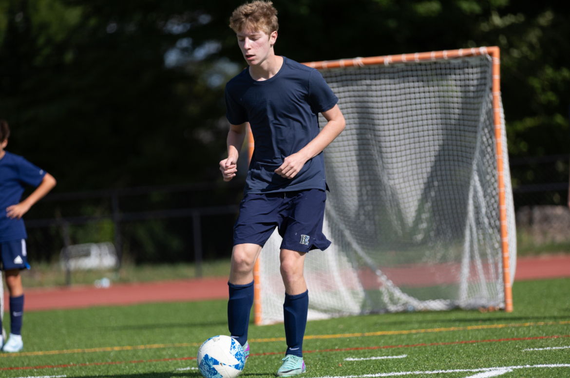 Michael Goff '26 warms up for a preseason soccer game against Hamburg at Springside Chestnut Hill Academy.