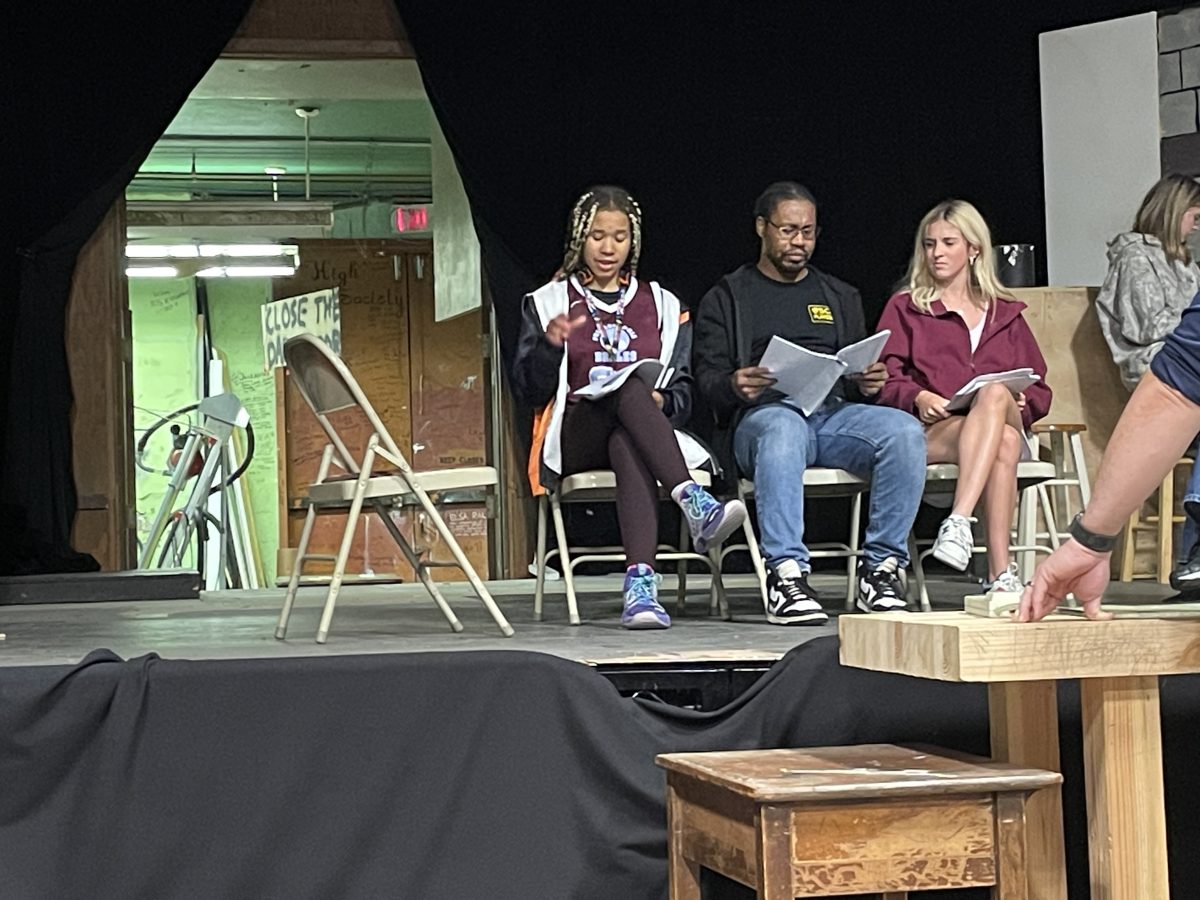 Florence Ajunwa, Director Terrance Hart, and Sofia Lima practicing a scene, with Hart standing in for an absent cast member.