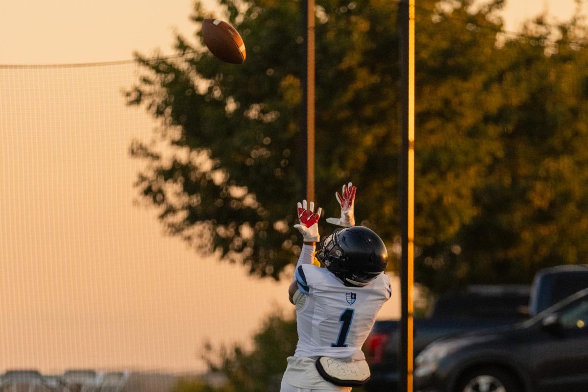 Aaron Clark goes up for a snag against the Hill School