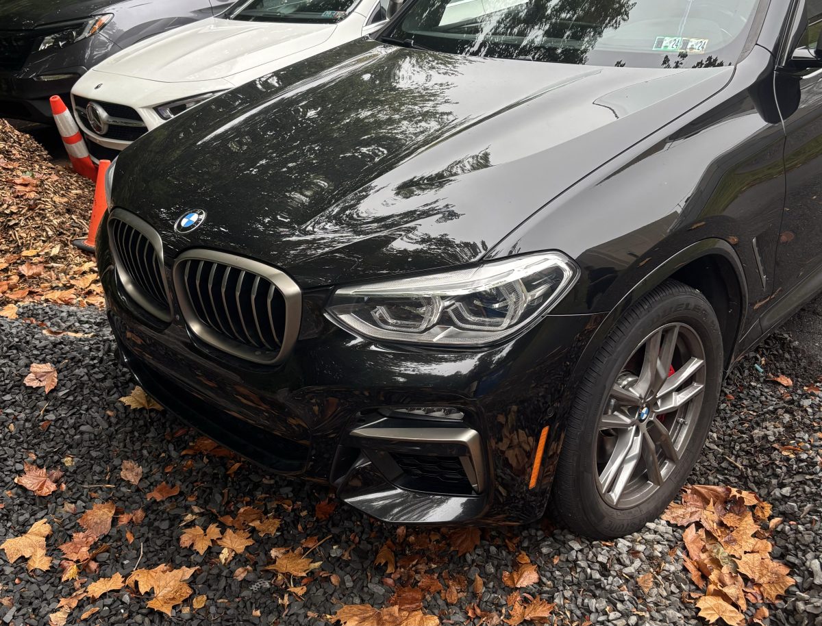 Senior Andrew Blum's car was parked in a coned-off gravel area beside the filled parking lot the morning of Thursday the 19th.