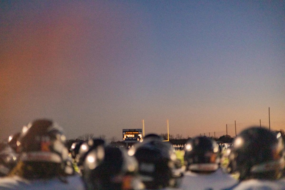 Devils look out to the field before their game against Malvern.