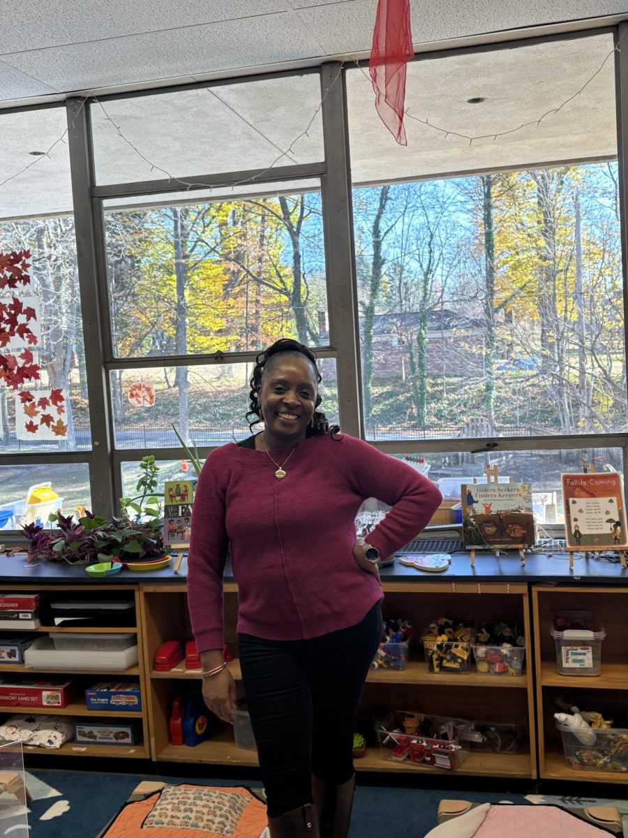 Lead teacher Donna Rascoe poses in her classroom during lunch. 
