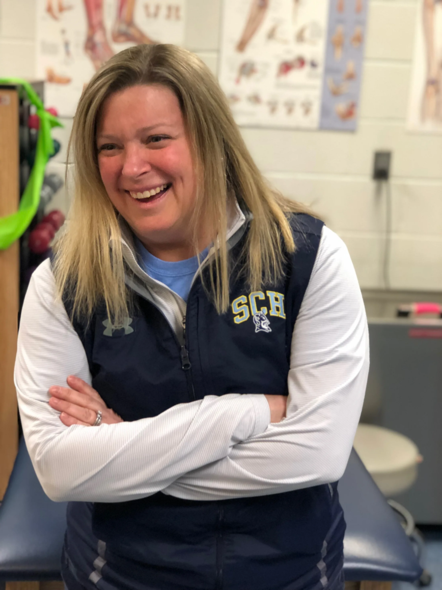 Mrs Keough working in the athletic training room. 