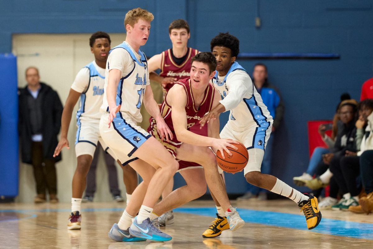 SCH swarms a Haverford defender.