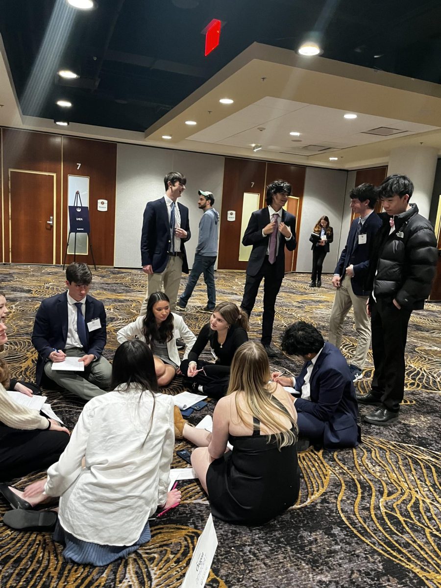 SCH delegates talk to other nations in an unmoderated caucus (Ms. Gross)