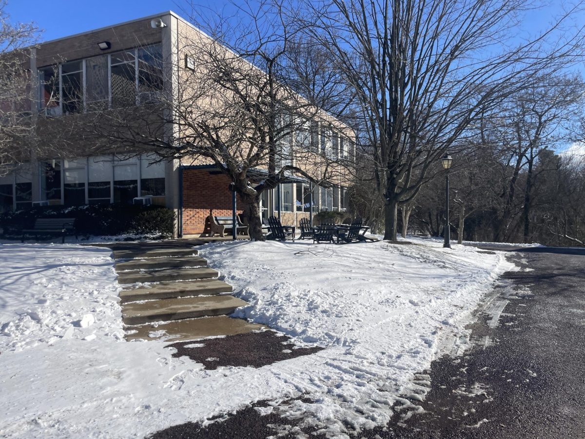 Snow piles in front of the former math building