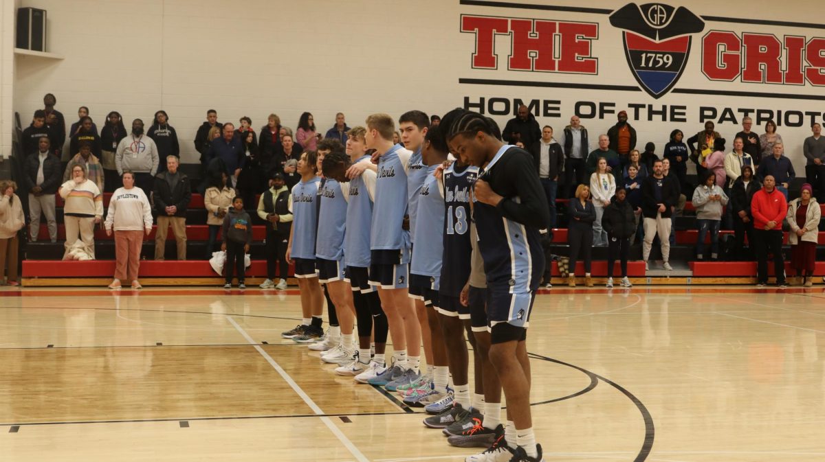 SCH Players standing during the National Anthem.