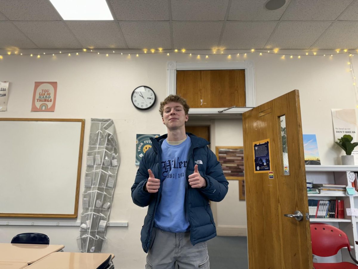 Micheal Goff '26 give a thumbs up in Film as Text Class