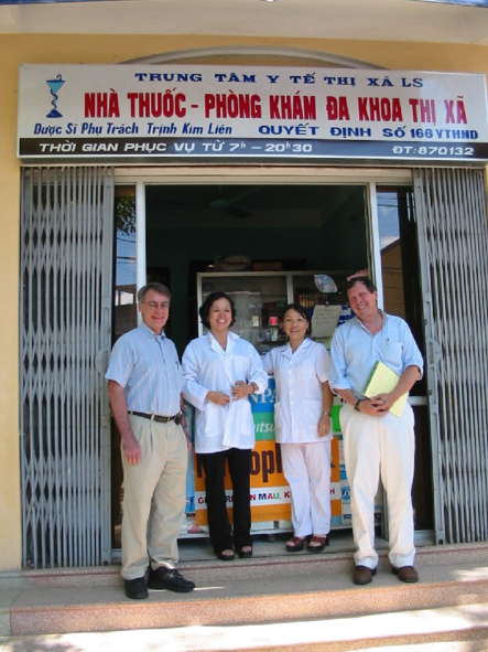 Ted Hammett (right) and colleague Don Des Jarlais (left) with pharmacists participate in HIV/AIDS 
prevention program for people who inject drugs. Lang Son, Vietnam, c. 2003