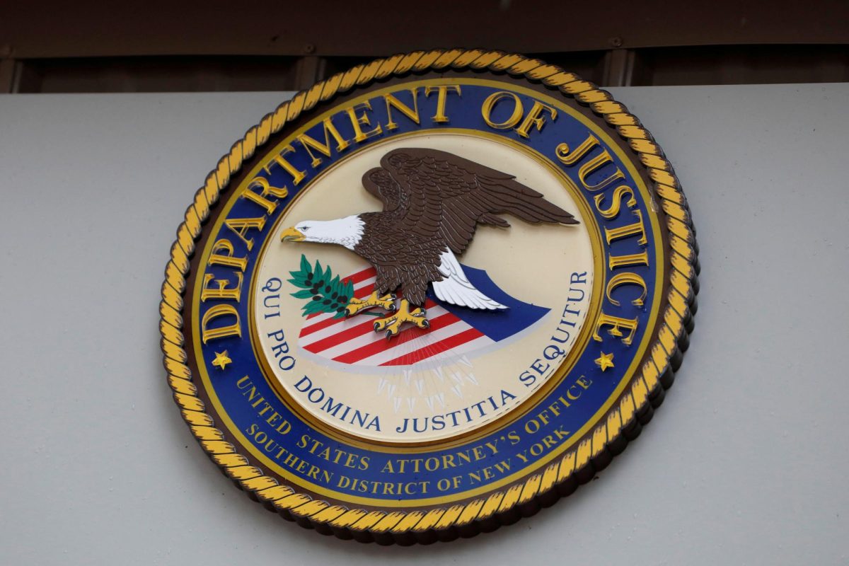 The seal of the United States Department of Justice is seen on the building exterior of the United States Attorney's Office of the Southern District of New York in Manhattan, New York City, U.S., August 17, 2020. REUTERS/Andrew Kelly
