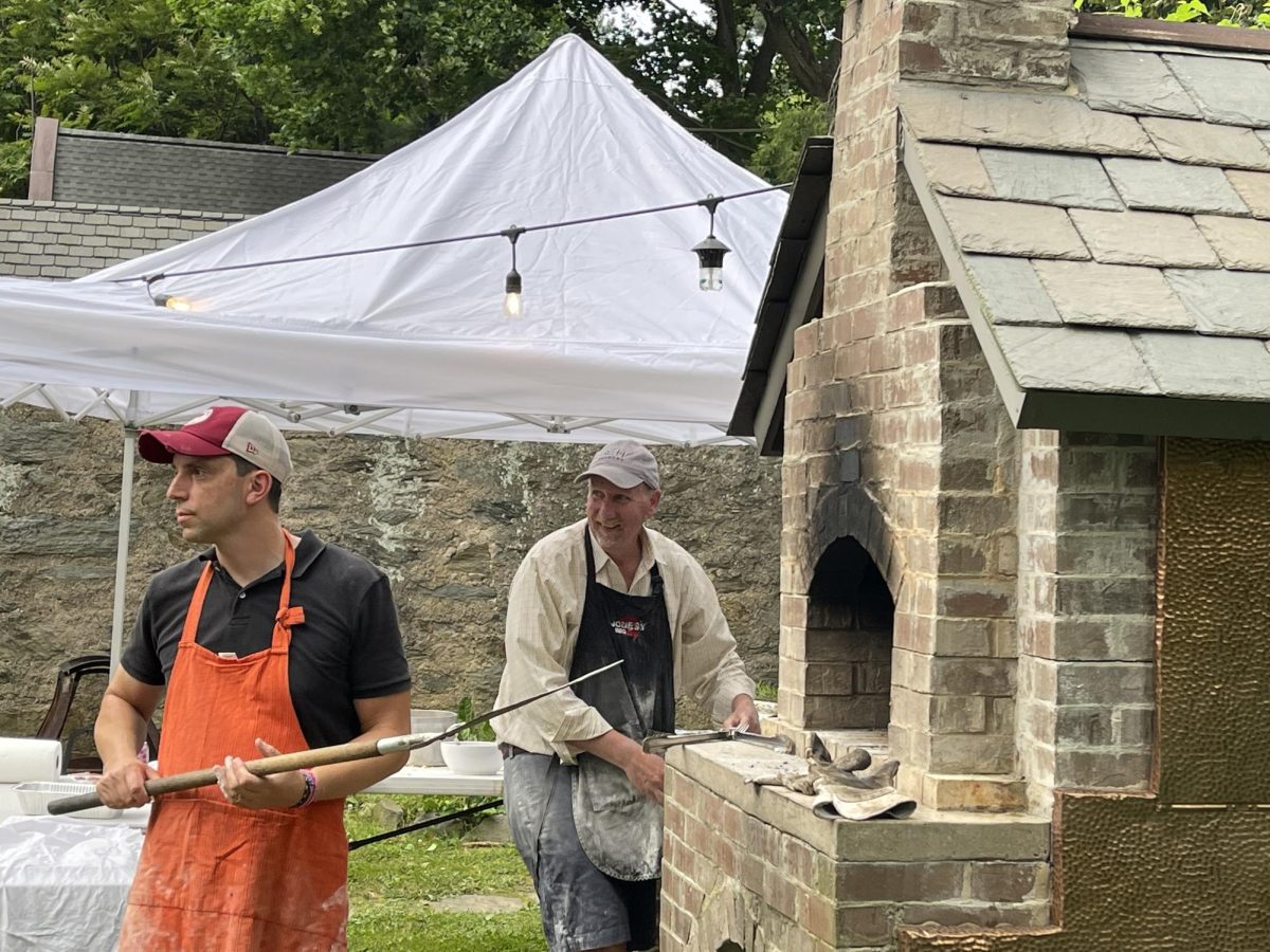 Mr. Norcini (Left) and Dr. Druggan (Right) at the Jennings house Pizza oven 