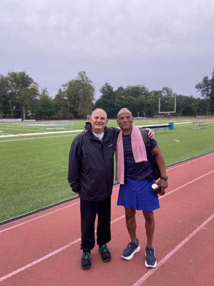 Brad Fishman (left) poses with friend on SCH track