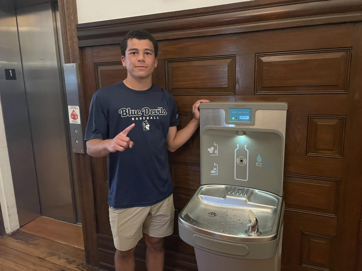 Cornelius stands next to the new top water fountain