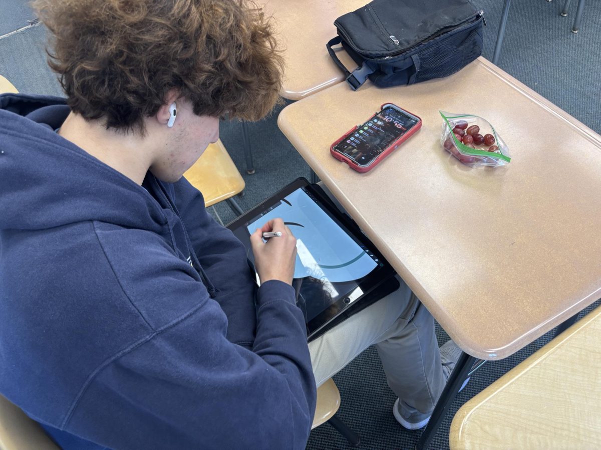 Tristan Ferraro '26 Drawling during his lunch break