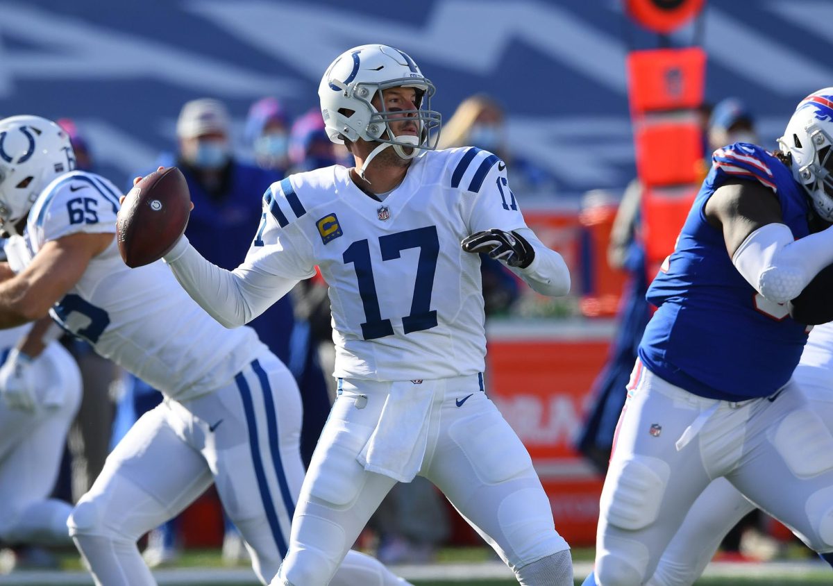 Jan 9, 2021; Orchard Park, New York, USA; Indianapolis Colts quarterback Philip Rivers (17) throws against the Buffalo Bills during the first half in the AFC Wild Card game at Bills Stadium. Mandatory Credit: Rich Barnes-USA TODAY Sports
