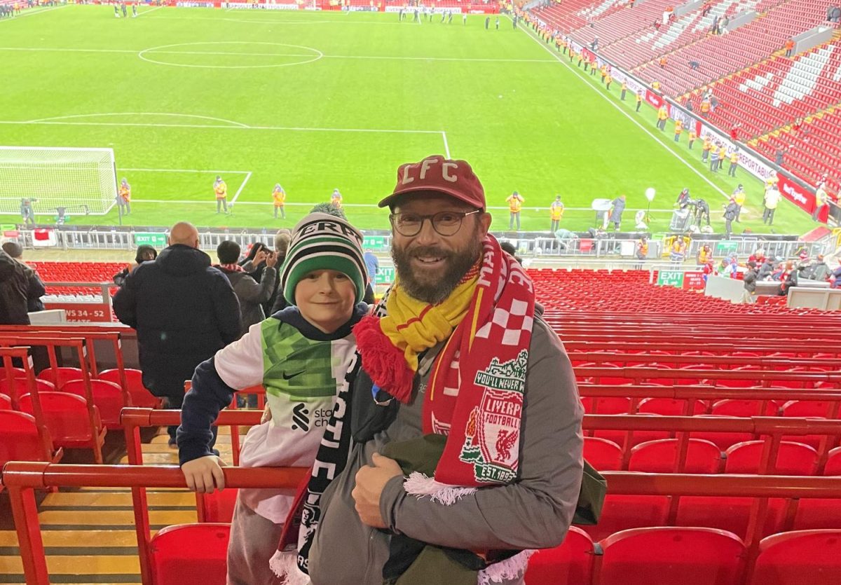 Mr. Zalasky and his son, Owen, attend a Liverpool game