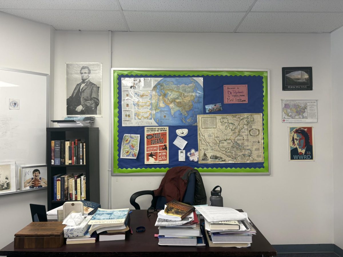 Image of History Teacher Dr. Richards' desk setup as part of his classroom setup 