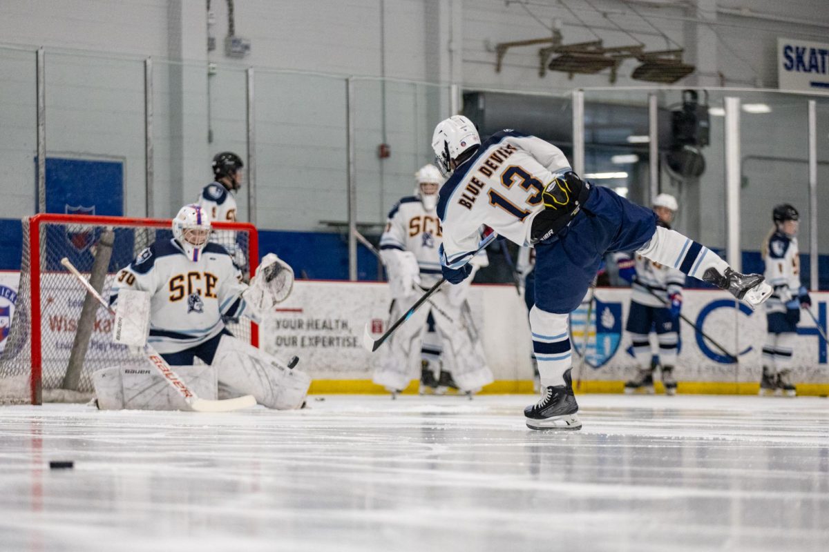 Blue Devils warming up at the Wissahickon Skating Rink before their match against EA 

