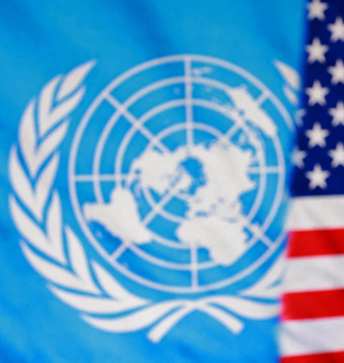 A 3D-printed miniature of U.S. President Donald Trump, U.S. flag, UN logo are seen in this illustration taken January 8, 2026. REUTERS/Dado Ruvic/Illustration