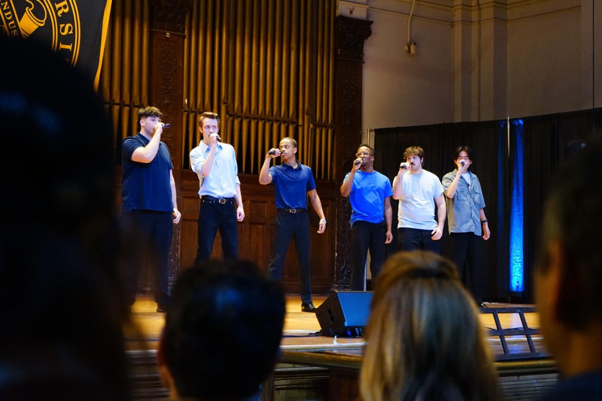 Jarrett Whaley performing at the International Championship for Collegiate A cappella with LiaChorus.