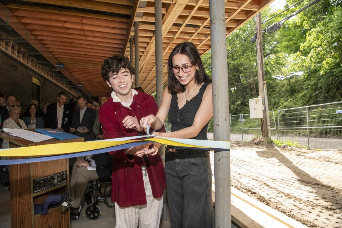 Jo Leon-Palfrey '26 and Colin Salis '26 cut the ribbon, officially celebrating the renovation of The Rec.